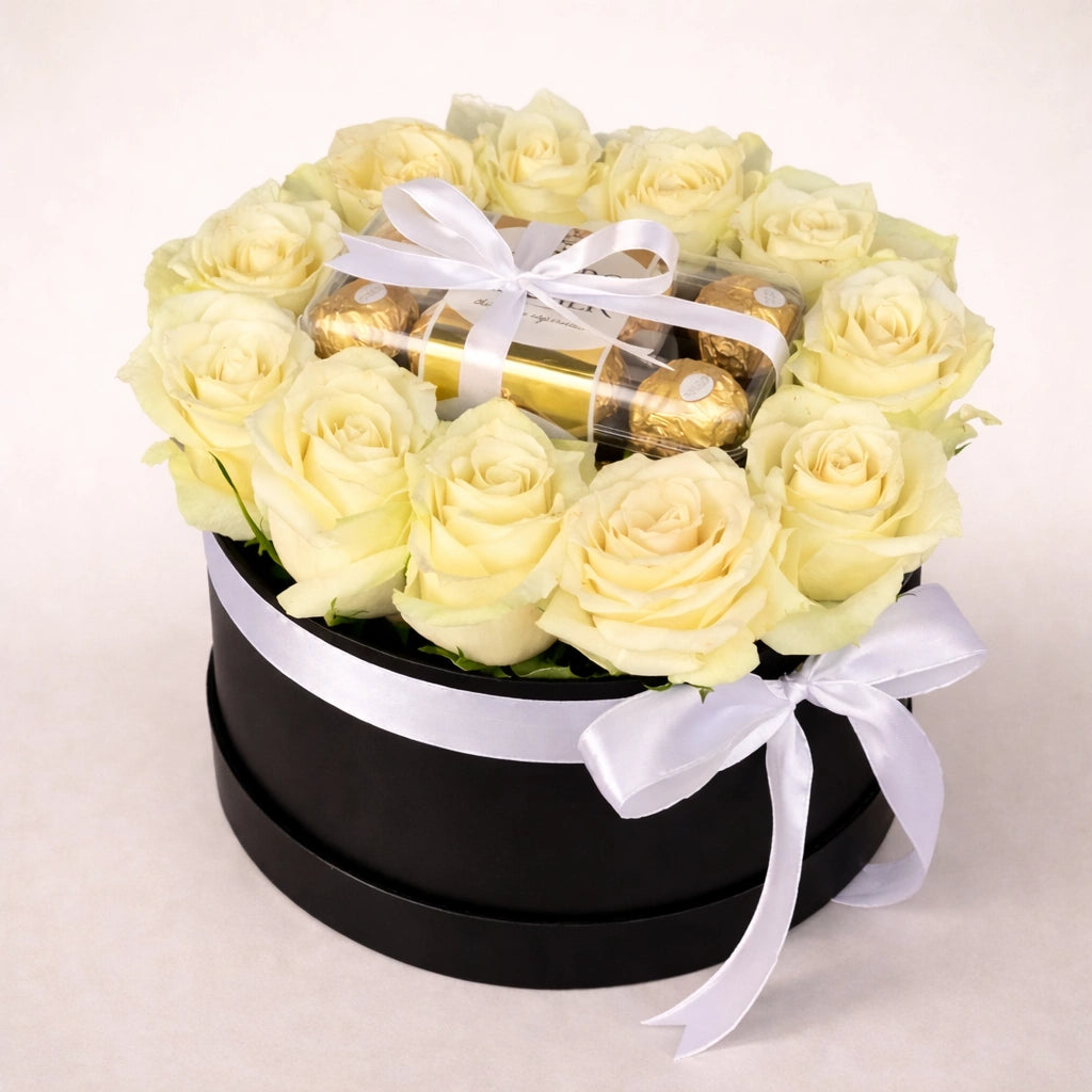 باقة فاخرة من الورود البيضاء وشوكولاتة فيريرو روشيه